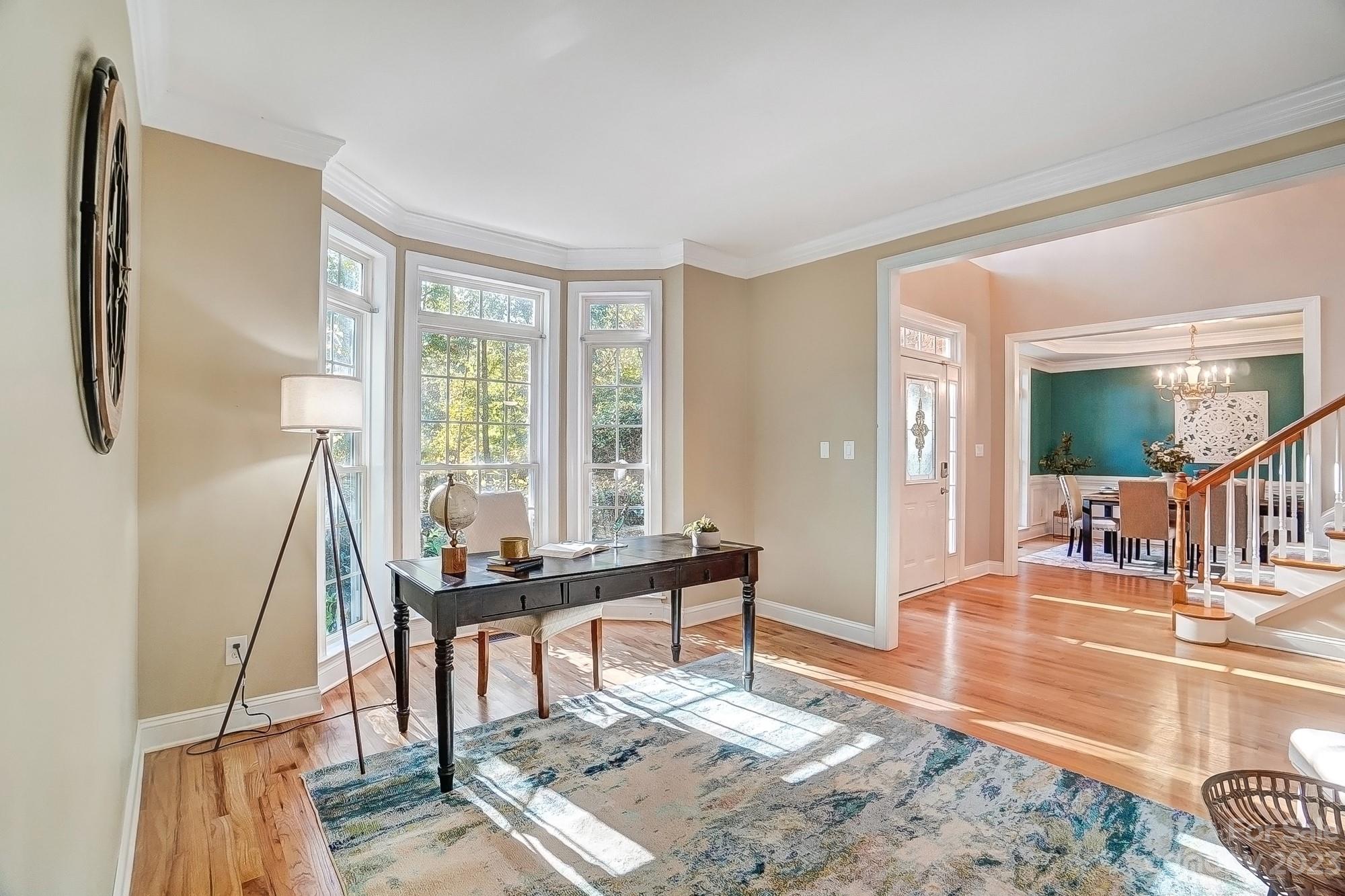 9710 Shadowmere Lane Weddington, NC 28104 - Photo 20 of 46 a living room with furniture and a wooden floor