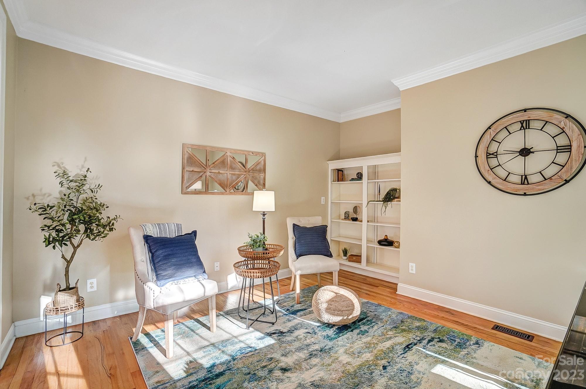 9710 Shadowmere Lane Weddington, NC 28104 - Photo 21 of 46 a living room with furniture and wooden floor