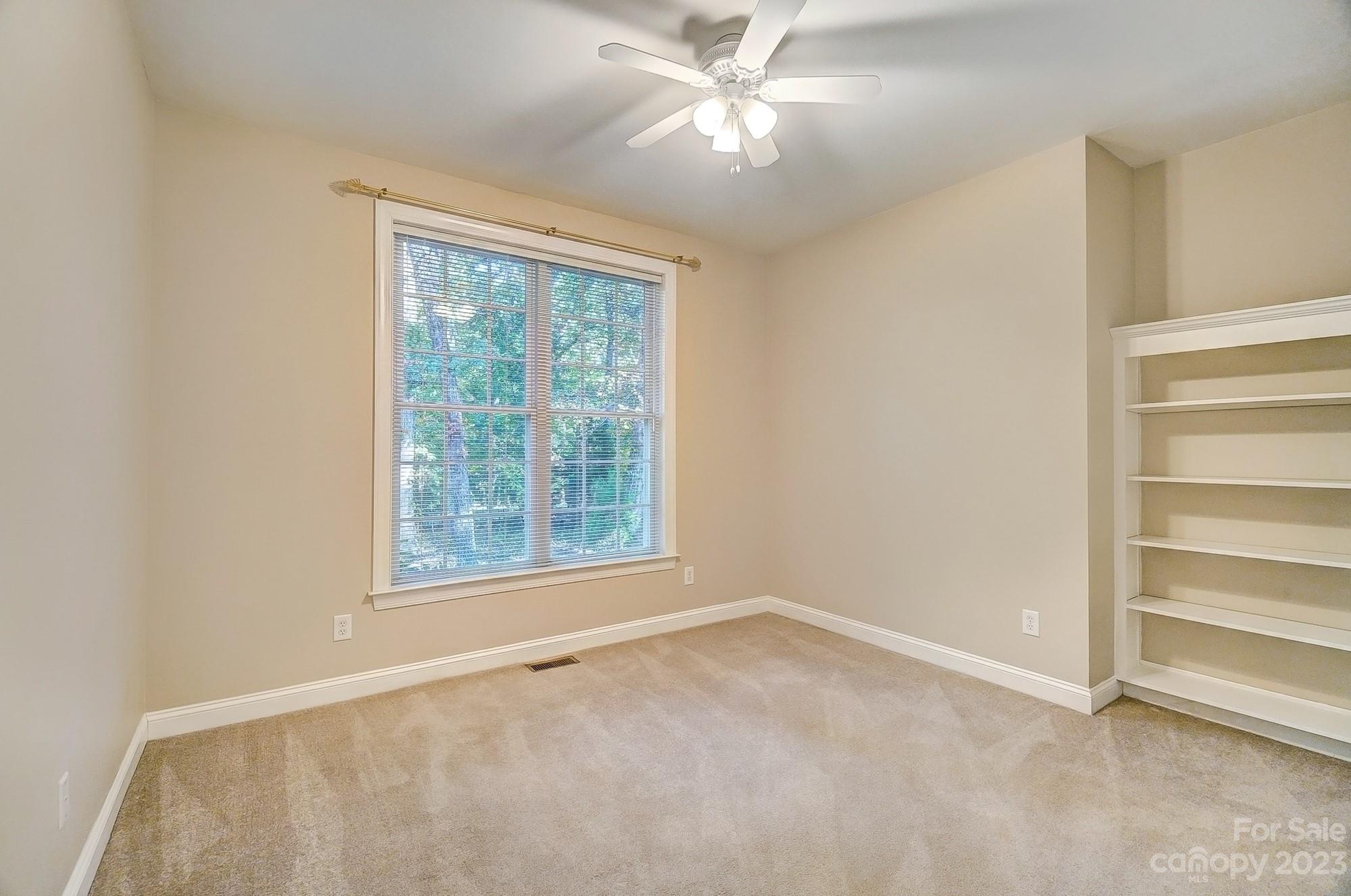 9710 Shadowmere Lane Weddington, NC 28104 - Photo 22 of 46 a view of an empty room with a window