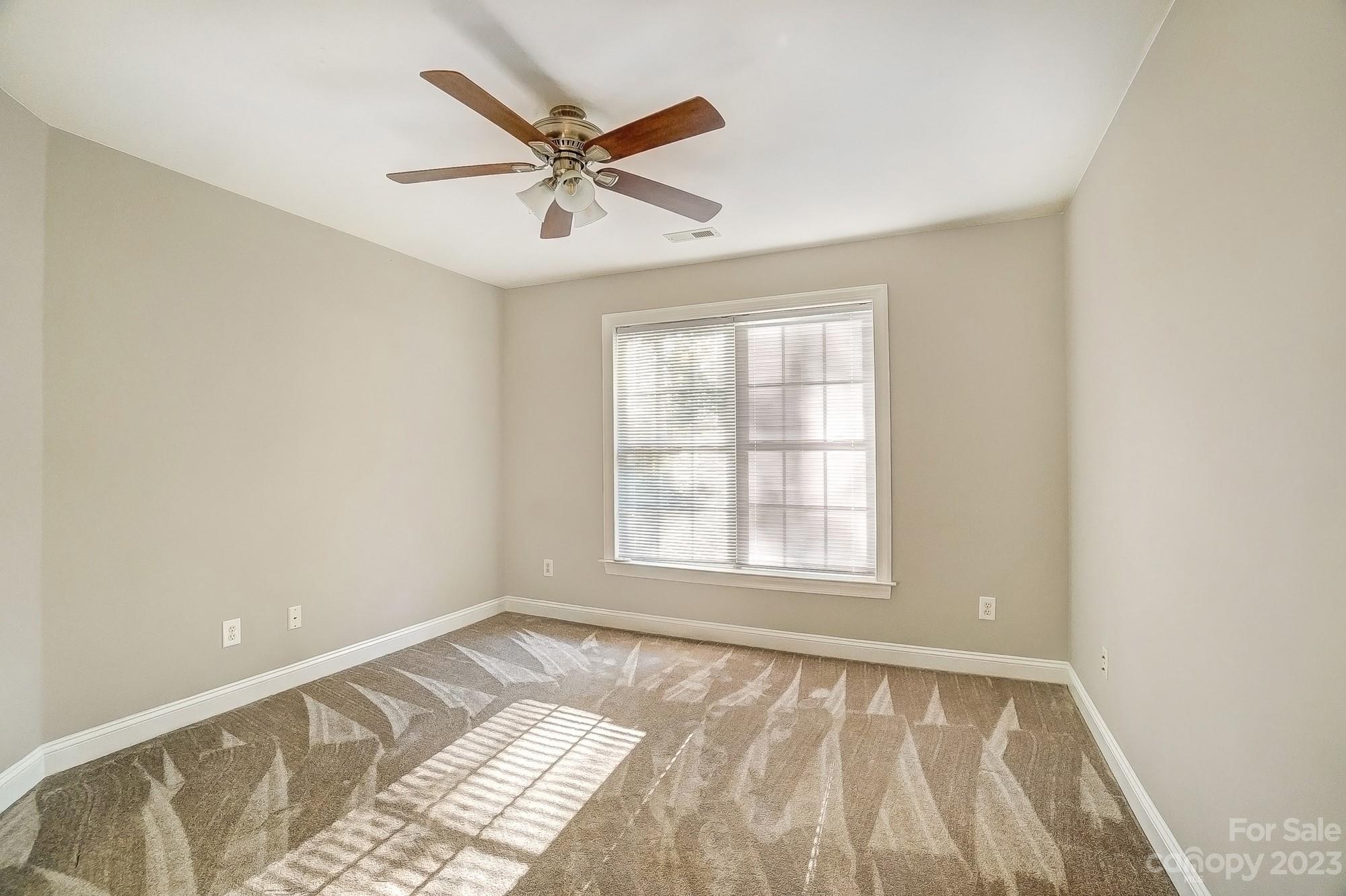 9710 Shadowmere Lane Weddington, NC 28104 - Photo 38 of 46 a view of an empty room and window