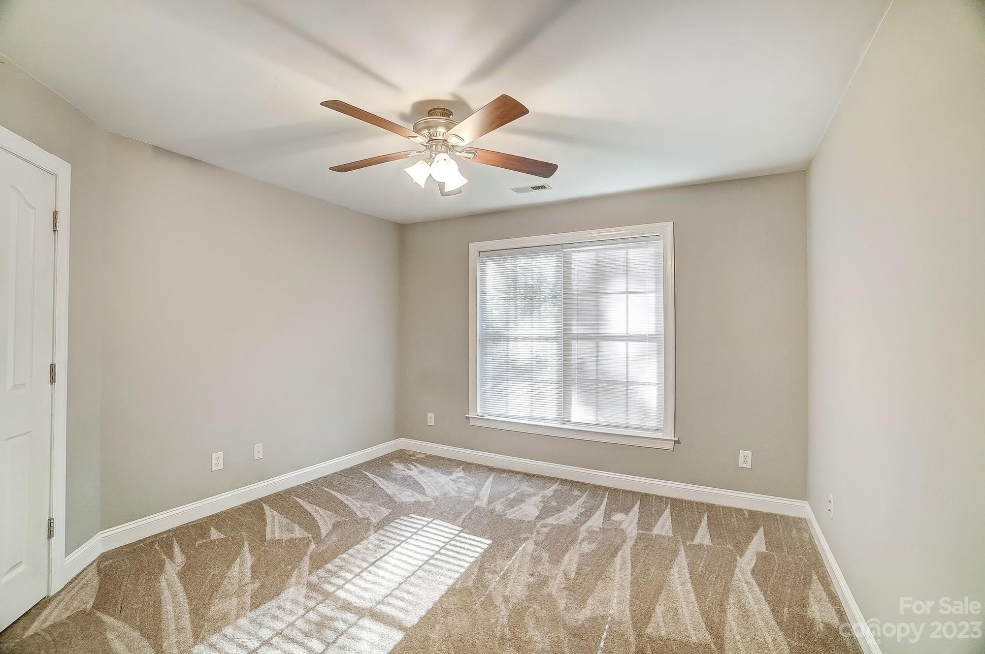 9710 Shadowmere Lane Weddington, NC 28104 - Photo 40 of 46 a view of an empty room and window