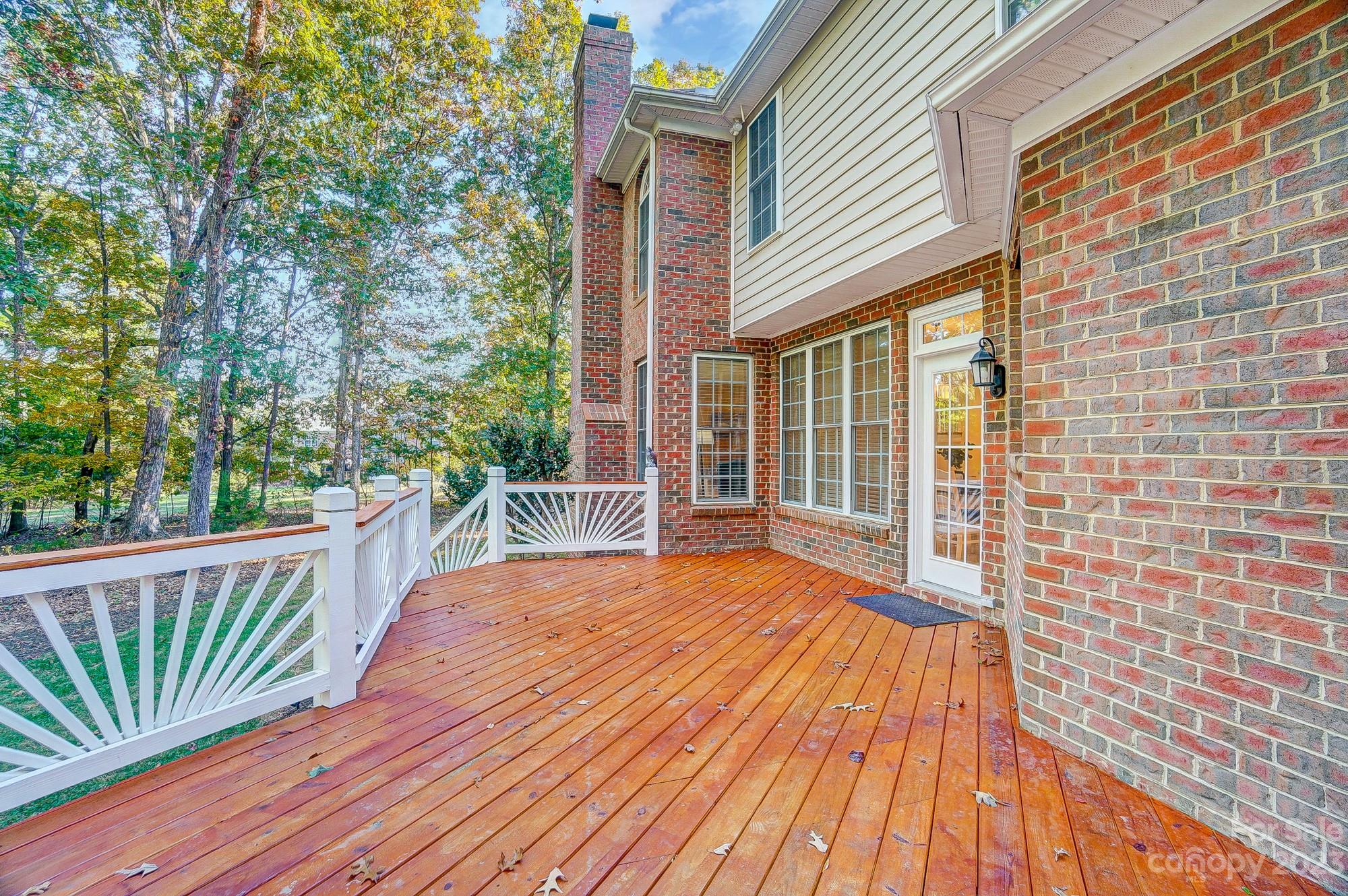9710 Shadowmere Lane Weddington, NC 28104 - Photo 42 of 46 a view of backyard with deck and wooden floor