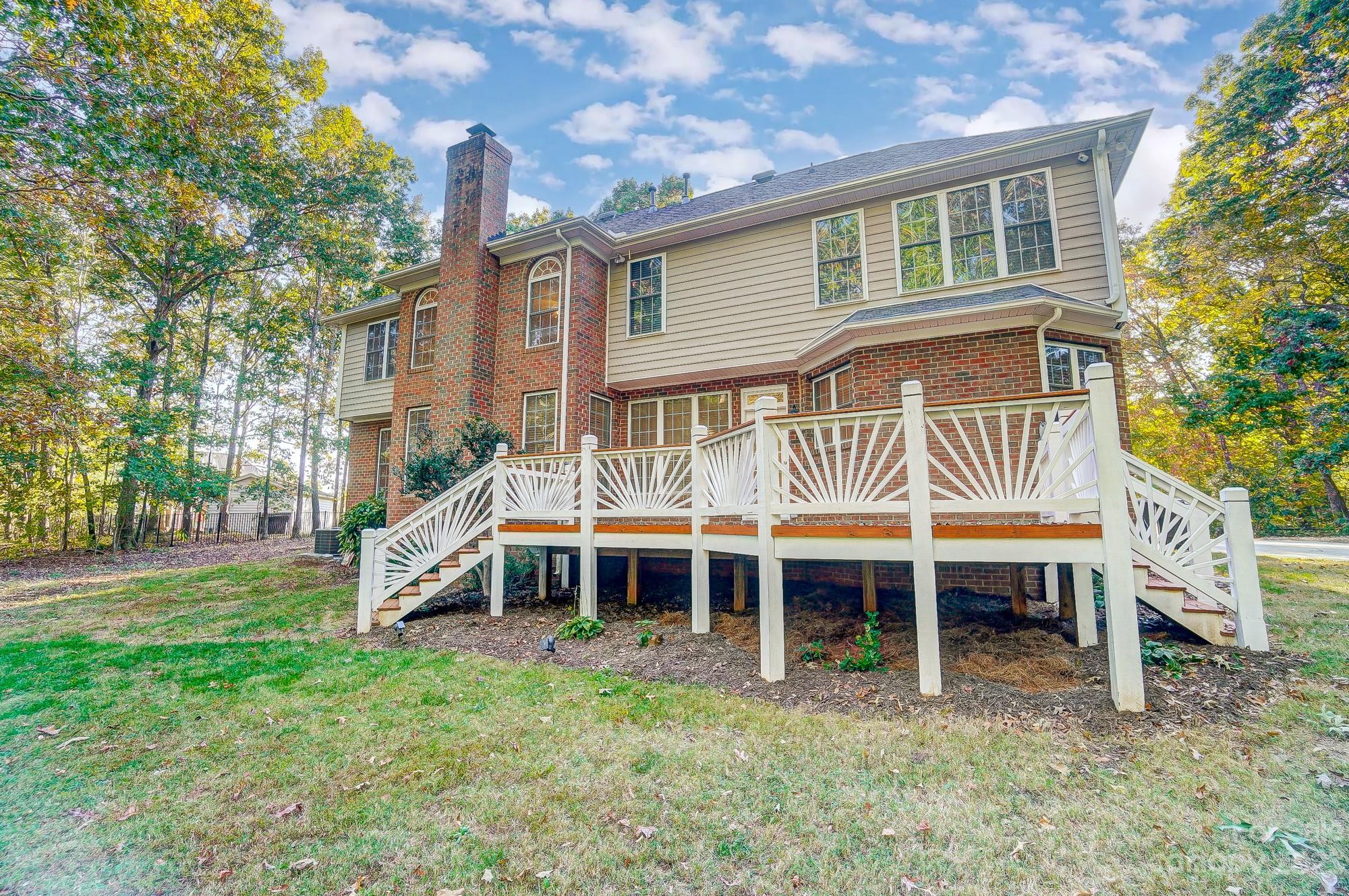 9710 Shadowmere Lane Weddington, NC 28104 - Photo 43 of 46 a view of a house with a yard and sitting area