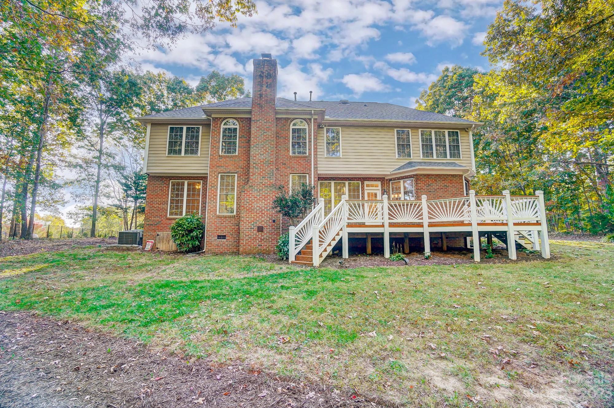 9710 Shadowmere Lane Weddington, NC 28104 - Photo 44 of 46 a view of a house with yard and sitting area