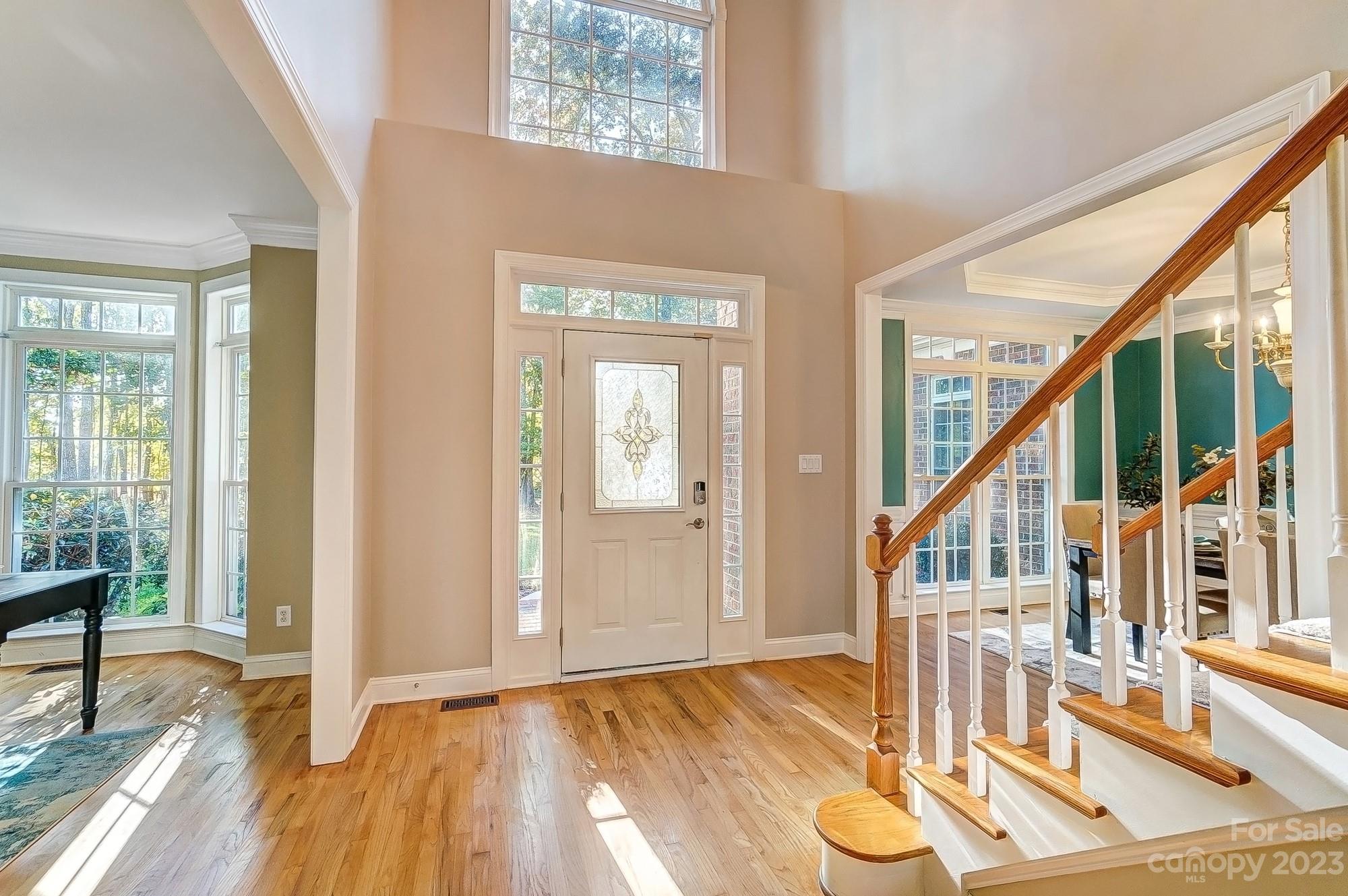 9710 Shadowmere Lane Weddington, NC 28104 - Photo 6 of 46 a view of entryway and hall with wooden floor