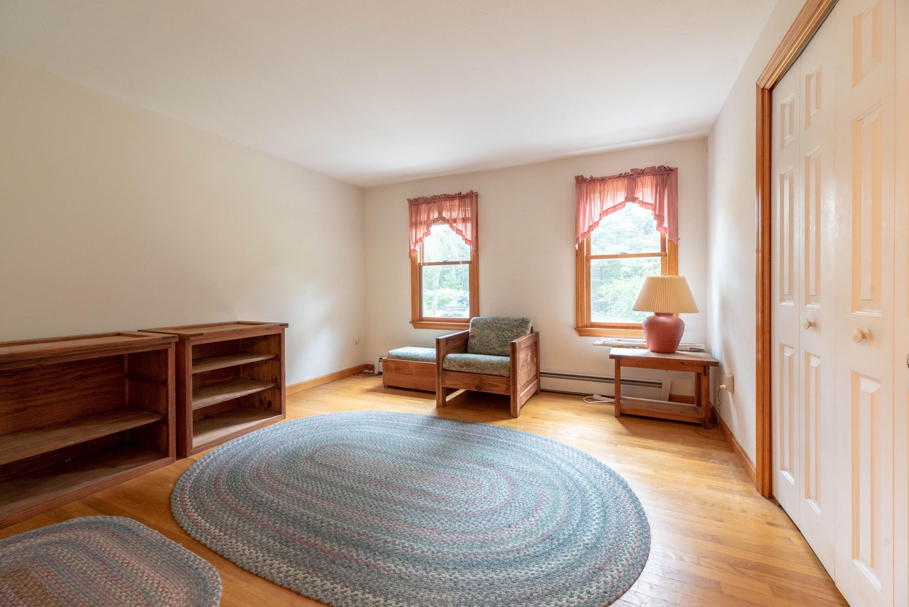 187 James Circle Mashpee, MA 02649 - Photo 12 of 23 a bedroom with furniture and a window