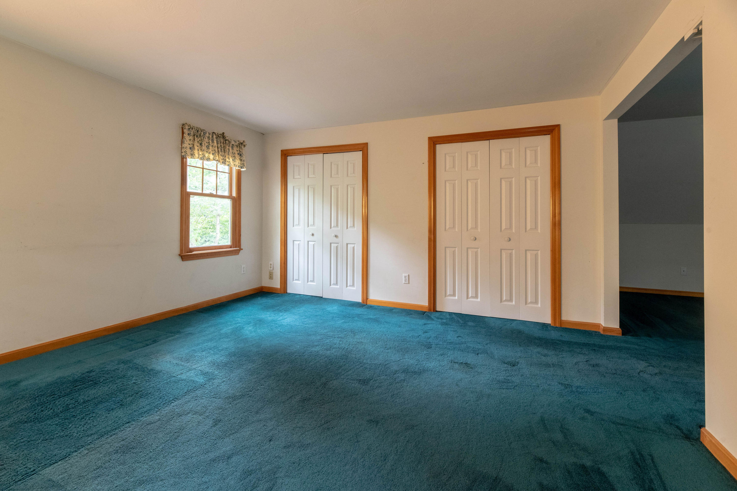 187 James Circle Mashpee, MA 02649 - Photo 20 of 23 an empty room with windows and closet