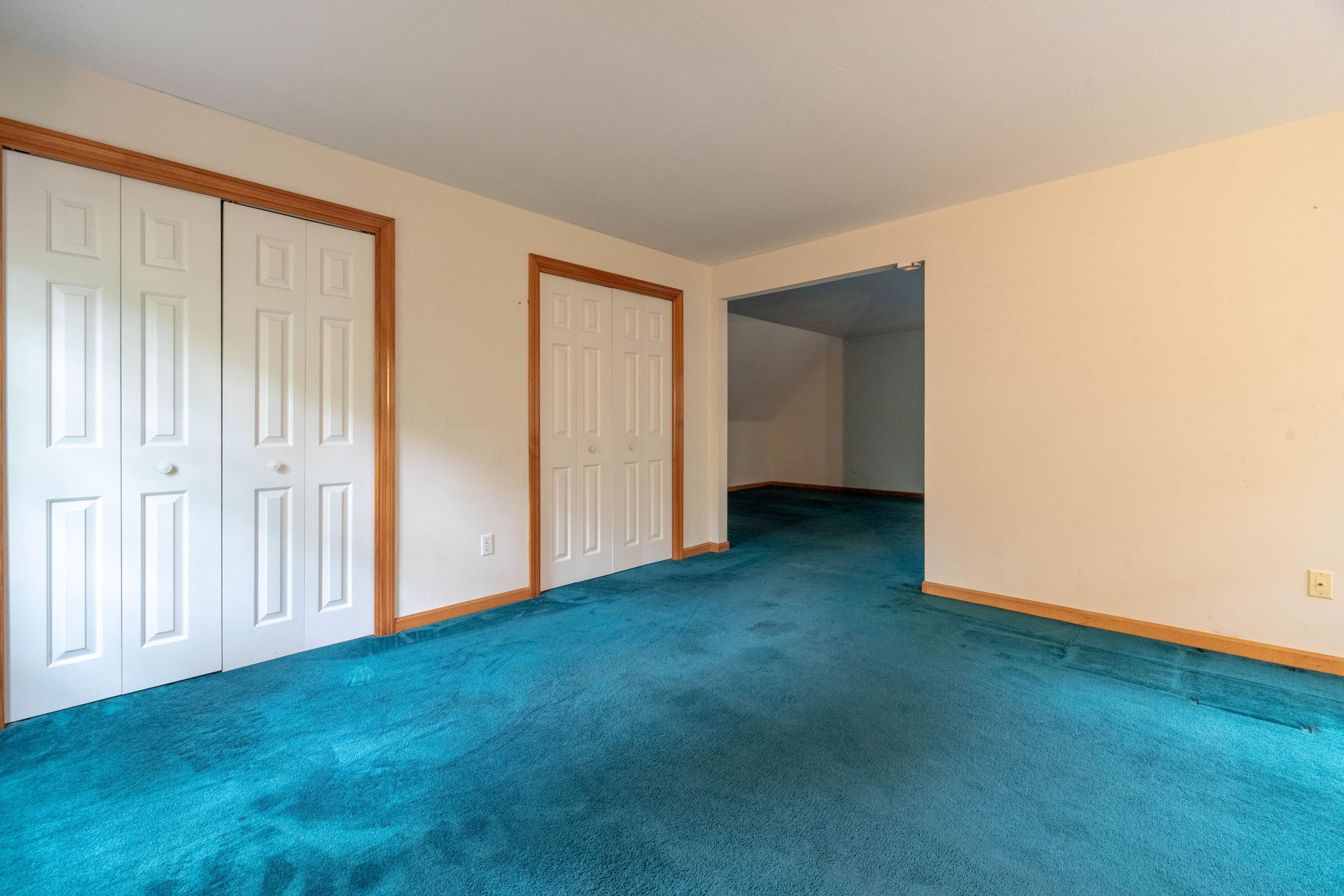 187 James Circle Mashpee, MA 02649 - Photo 21 of 23 a view of an empty room with closet and a window