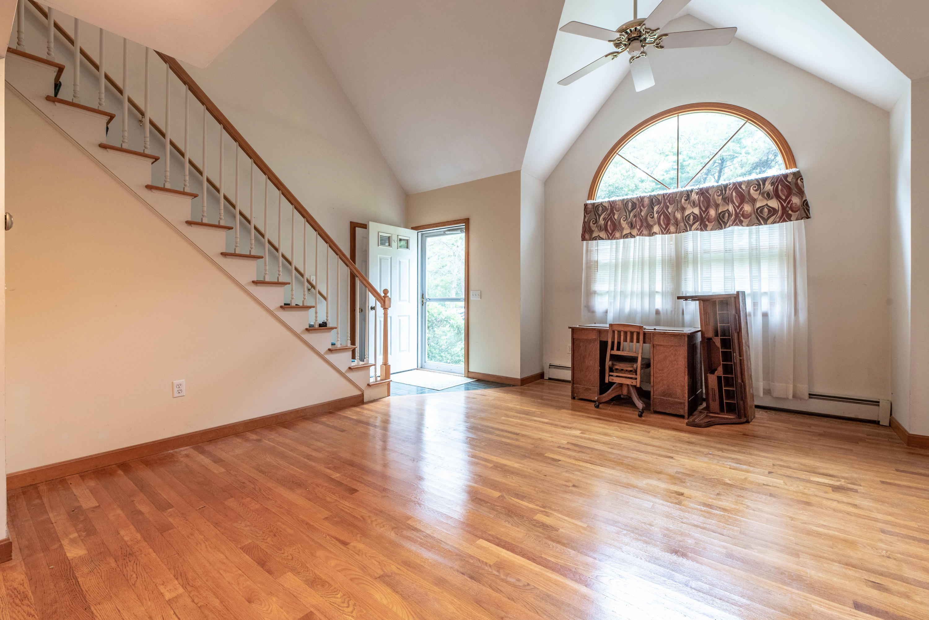 187 James Circle Mashpee, MA 02649 - Photo 5 of 23 a view of an entryway with workspace and a window