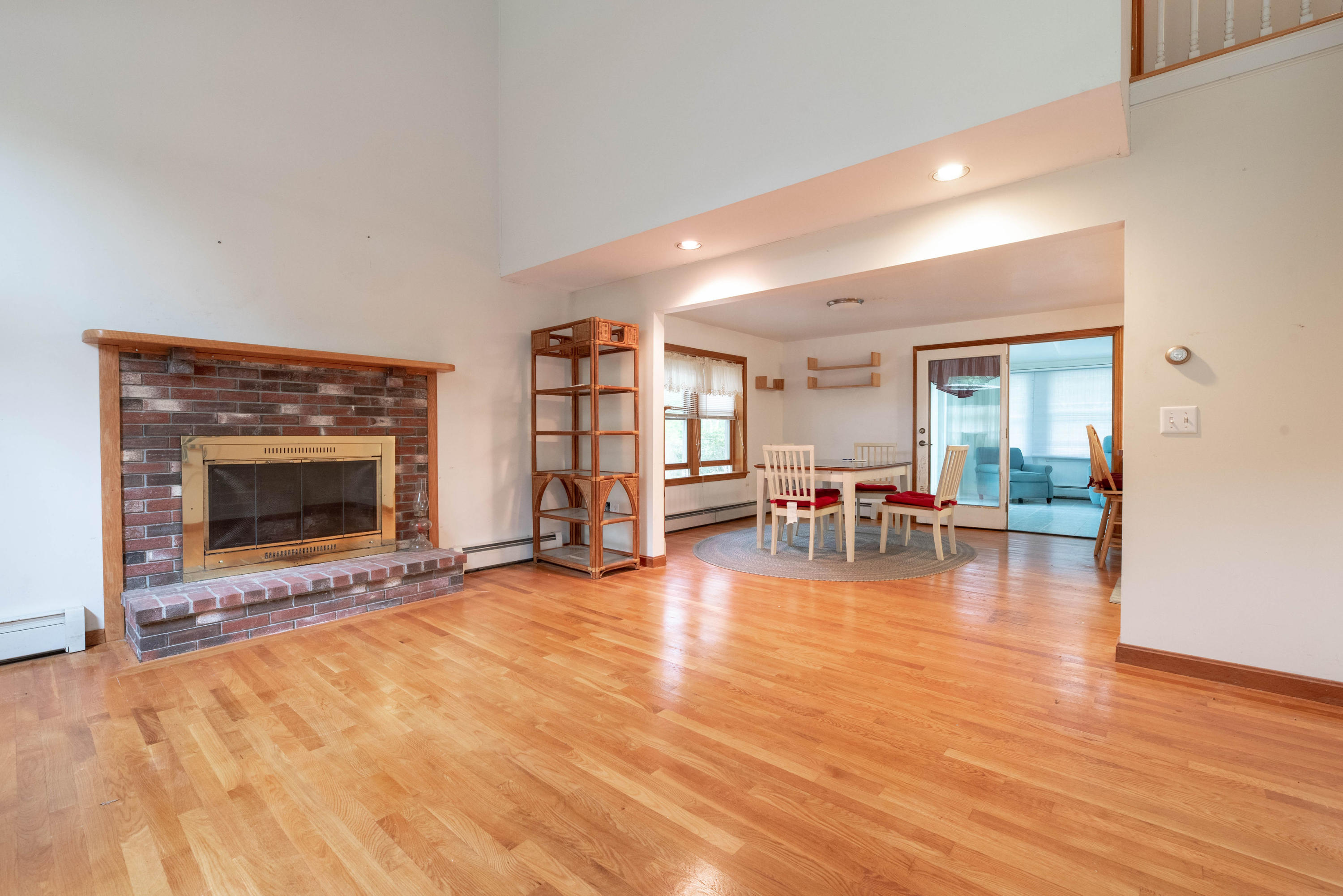 187 James Circle Mashpee, MA 02649 - Photo 6 of 23 a view of an empty room with fireplace and a window