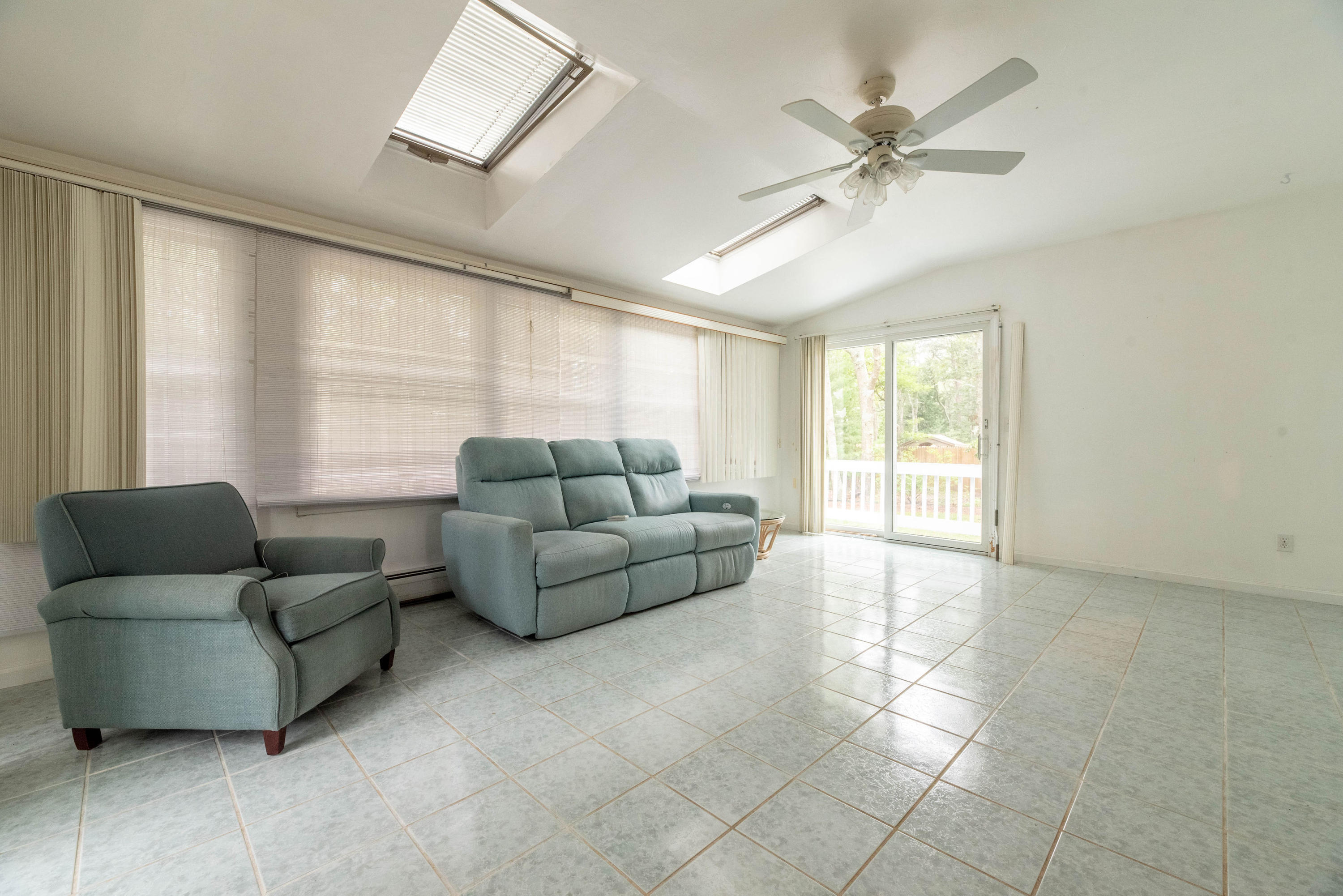 187 James Circle Mashpee, MA 02649 - Photo 10 of 23 a living room with furniture and a window