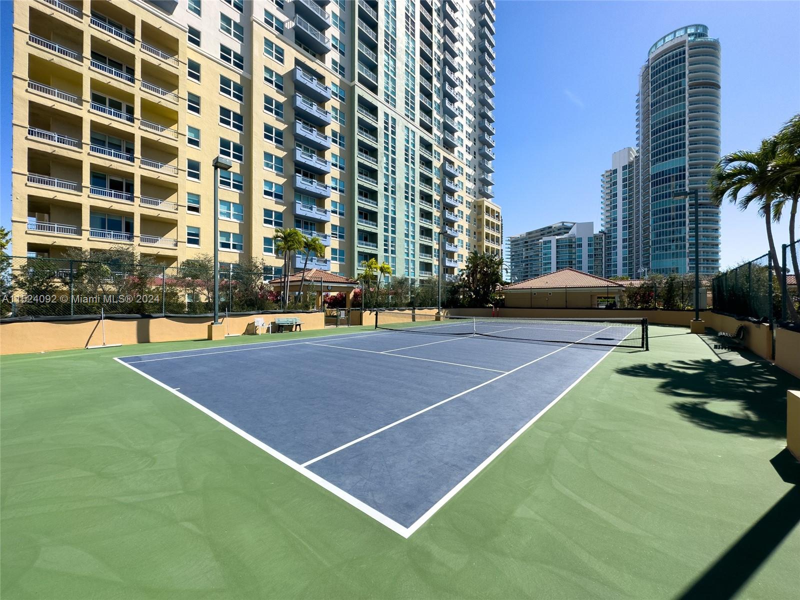 90 Alton Road, Unit 902 Miami Beach, FL 33139 - Photo 31 of 35 a view of a tennis court