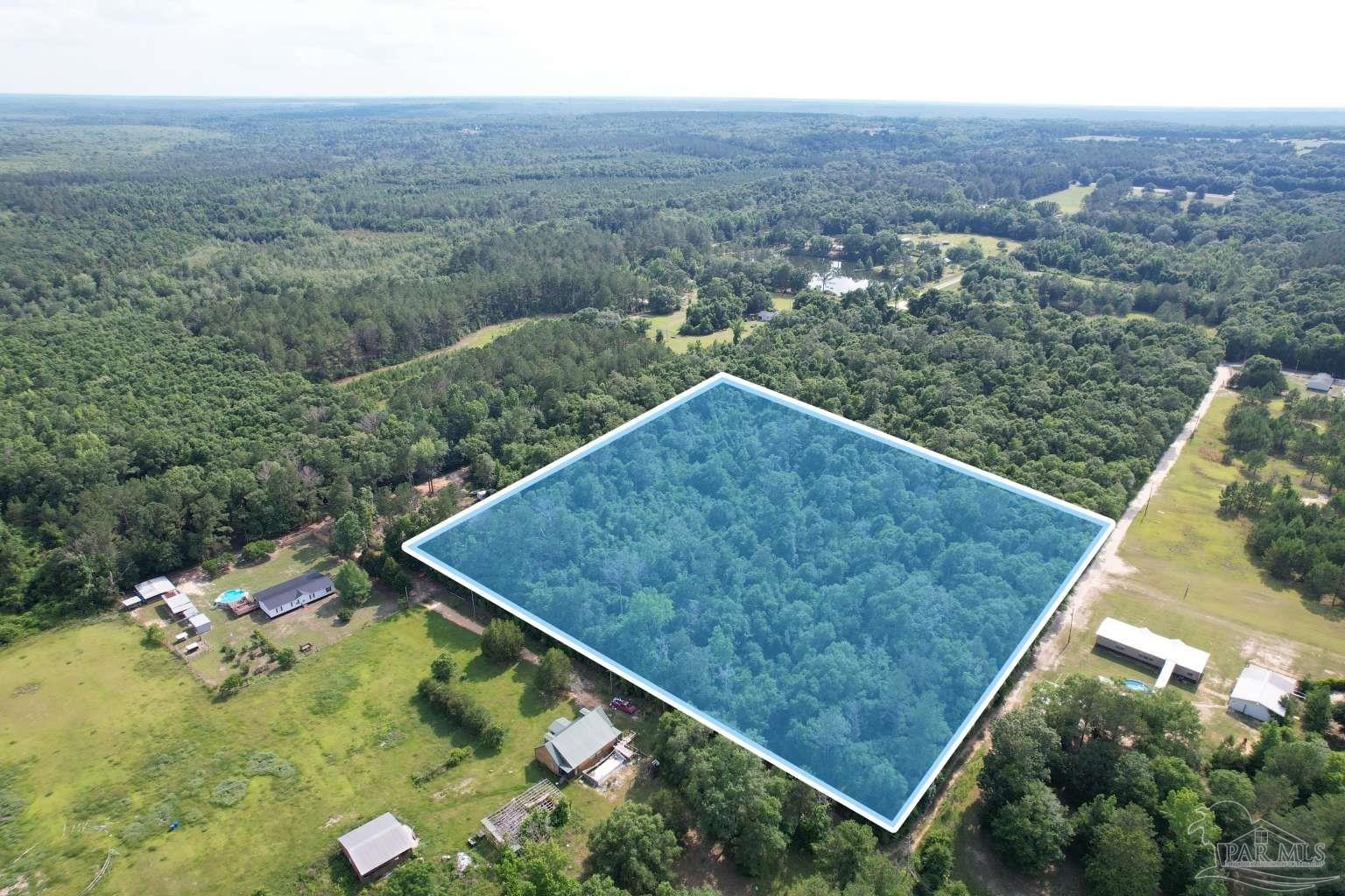 400 Brown Road McDavid, FL 32568 - Photo 3 of 10 an aerial view of a house
