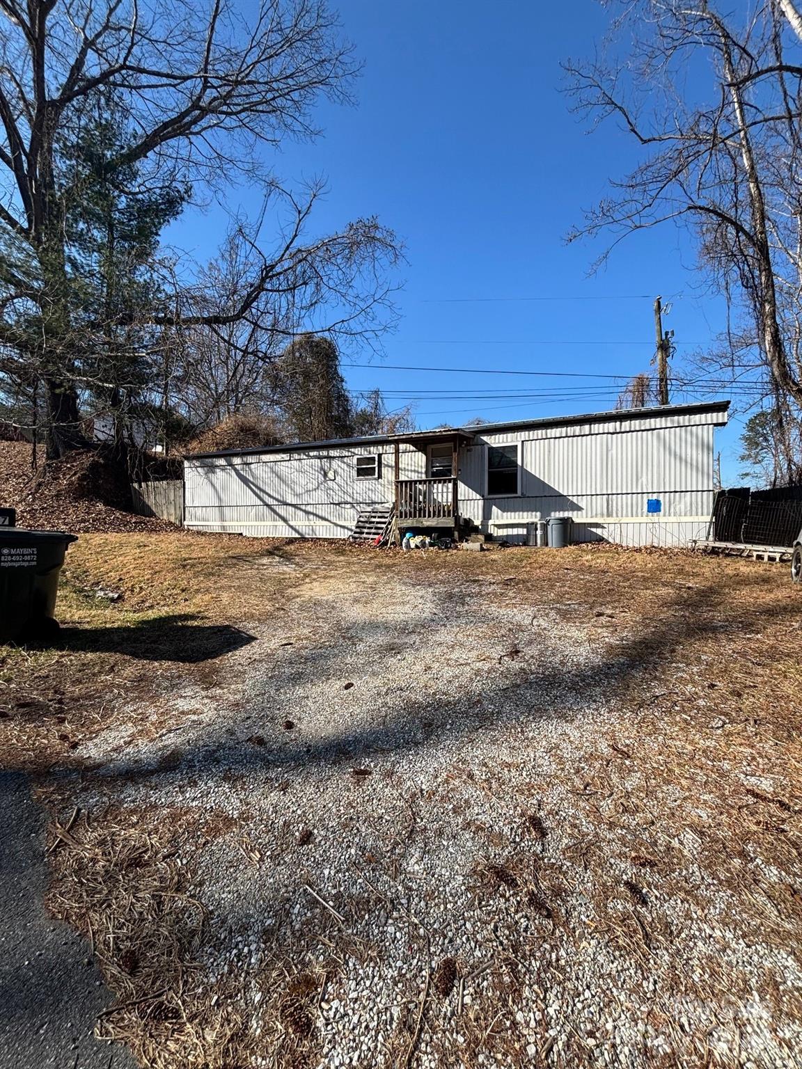 905 Hutch Mountain Road Fletcher, NC 28732 - Photo 8 of 9 a view of a backyard of the house