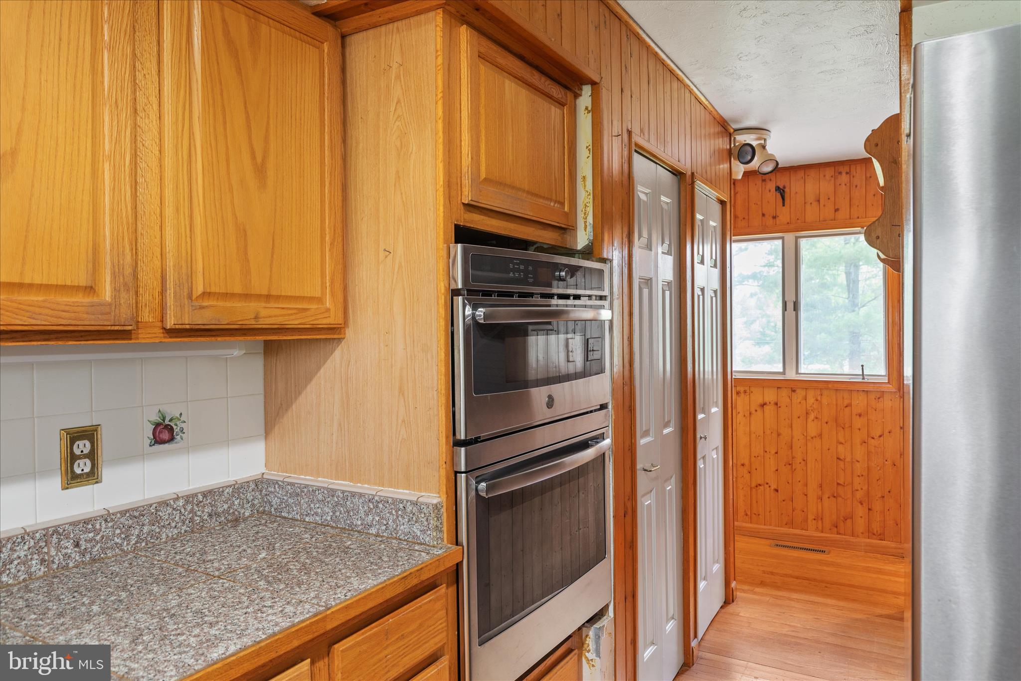 263 Bowling Green Road Front Royal, VA 22630 - Photo 24 of 75 a kitchen with stainless steel appliances granite countertop a refrigerator and cabinets