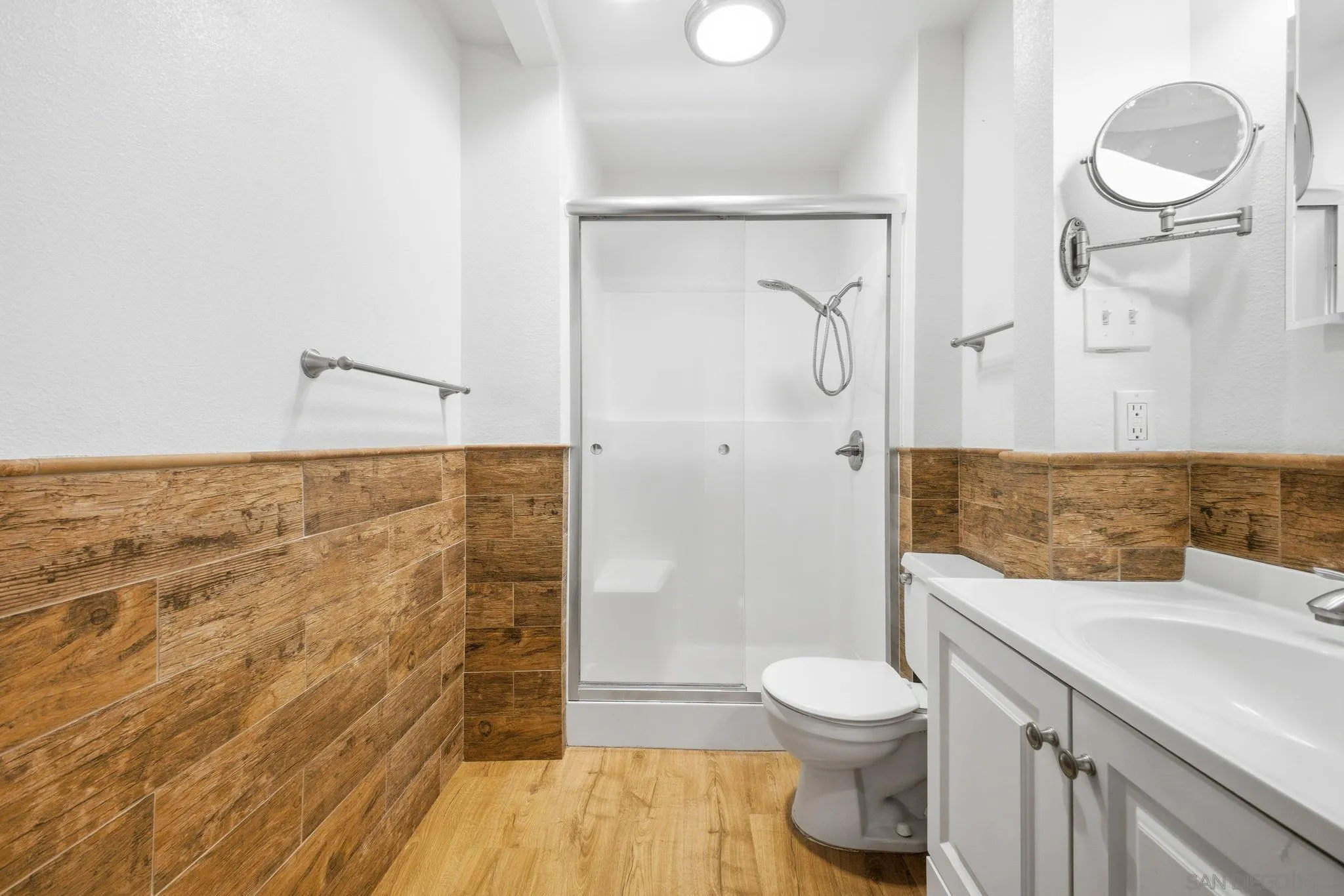 6019 Rancho Mission Road, Unit 204 San Diego, CA 92108 - Photo 5 of 38 Upgraded spacious primary bathroom with shower