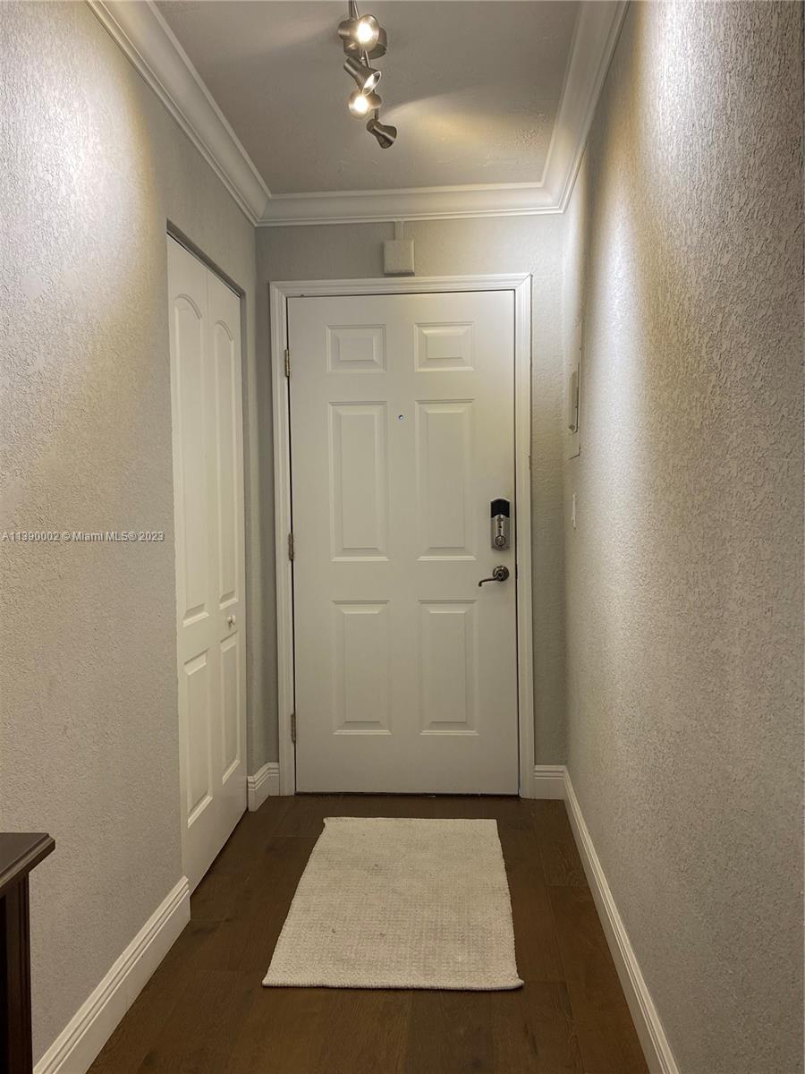 an entryway view with hallway