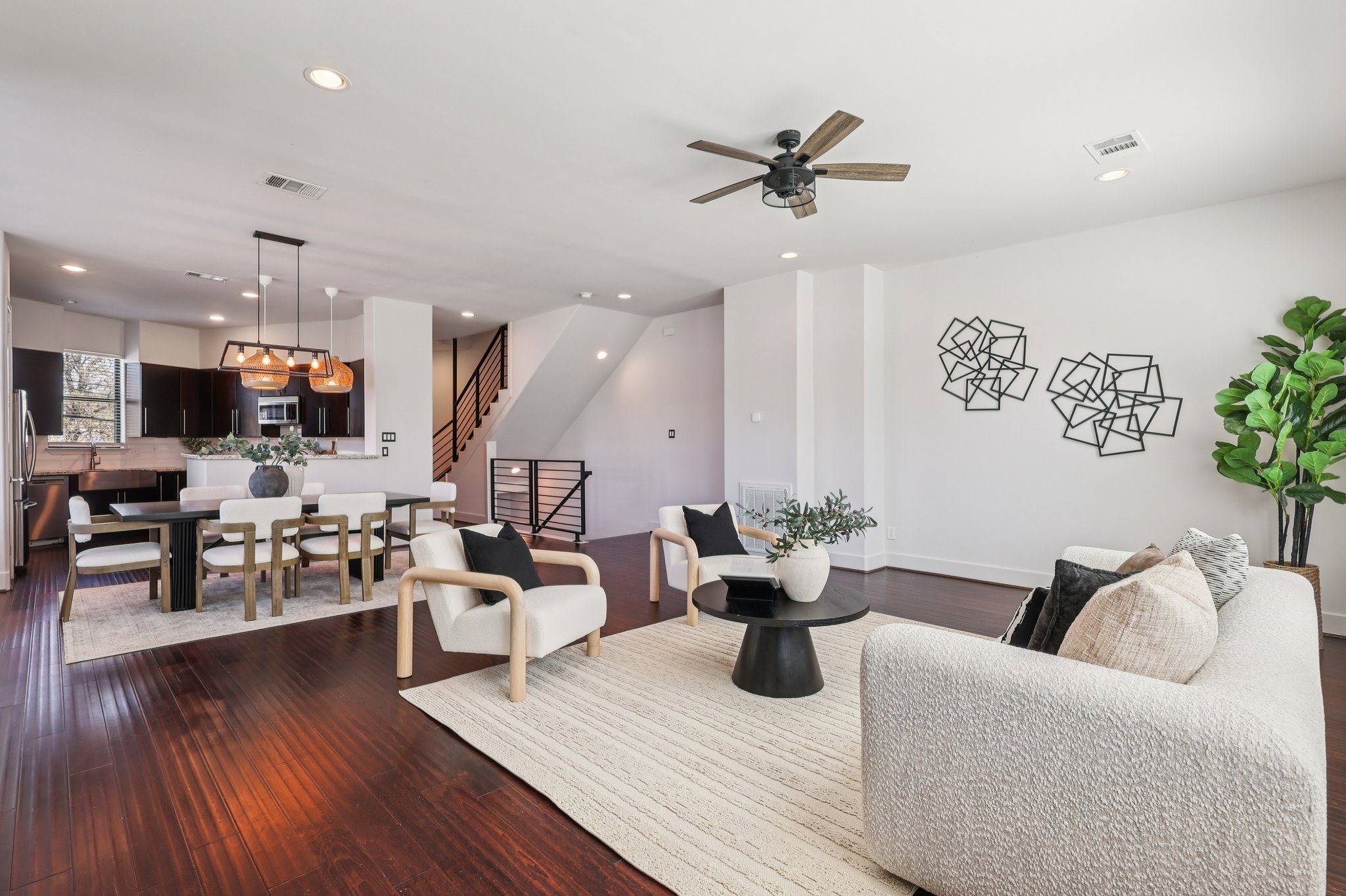 1771 Michigan Street Houston, TX 77006 - Photo 4 of 28 The living room and dining space flow seamlessly together, perfect for entertaining.