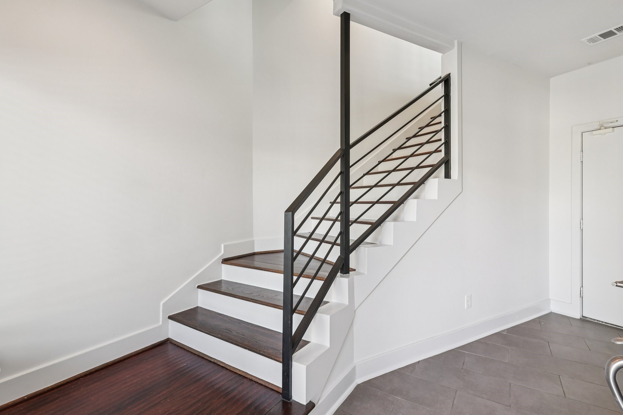 1771 Michigan Street Houston, TX 77006 - Photo 9 of 28 Welcome to 1771 Michigan St! The first floor has access to the attached garage and a secondary bedroom.