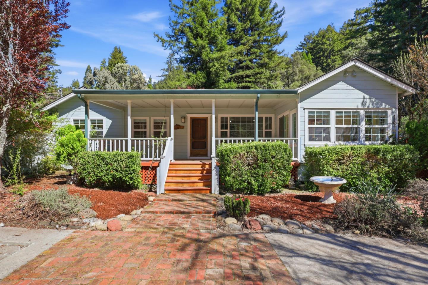 17760 China Grade Road Boulder Creek, CA 95006 - Photo 1 of 45 front view of a house with a yard