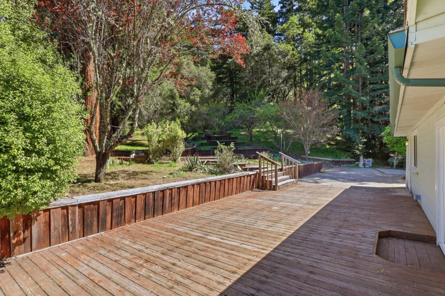 17760 China Grade Road Boulder Creek, CA 95006 - Photo 14 of 45 a view of a deck with chairs and wooden fence