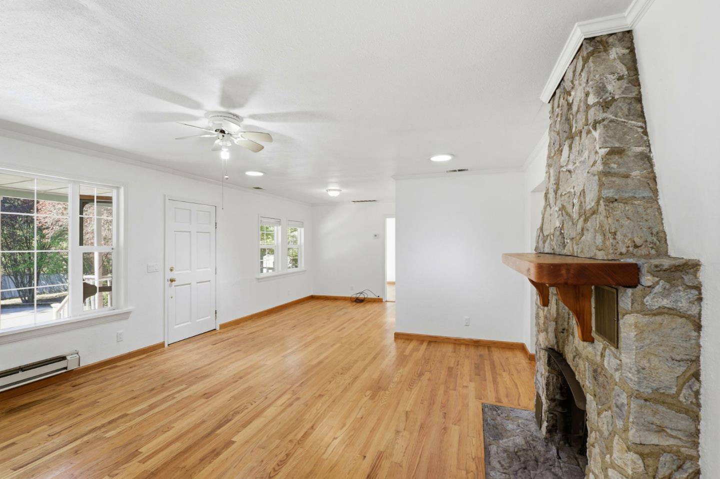 17760 China Grade Road Boulder Creek, CA 95006 - Photo 20 of 45 wooden floor in an empty room with a window