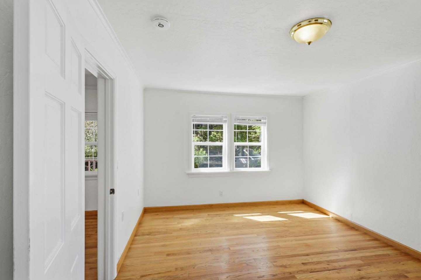 17760 China Grade Road Boulder Creek, CA 95006 - Photo 33 of 45 a view of empty room with wooden floor