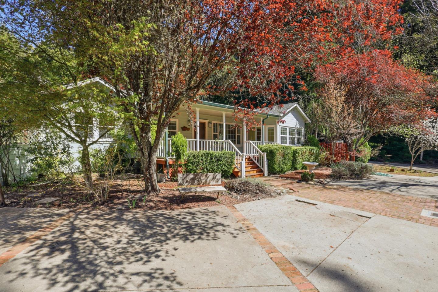 17760 China Grade Road Boulder Creek, CA 95006 - Photo 4 of 45 a front view of a house with garden