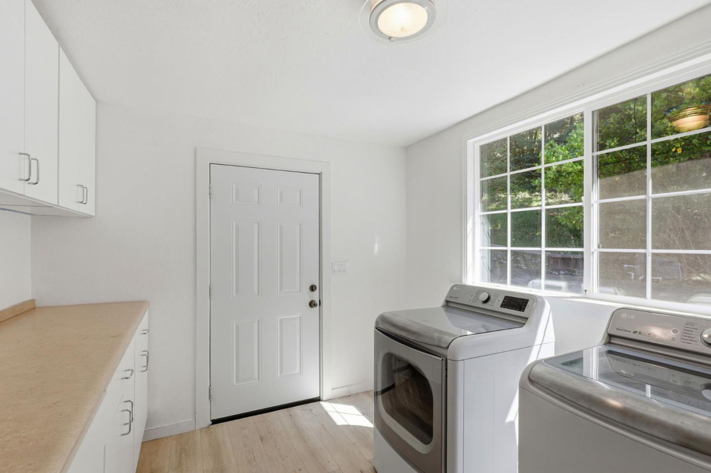 17760 China Grade Road Boulder Creek, CA 95006 - Photo 42 of 45 a utility room with dryer and washer