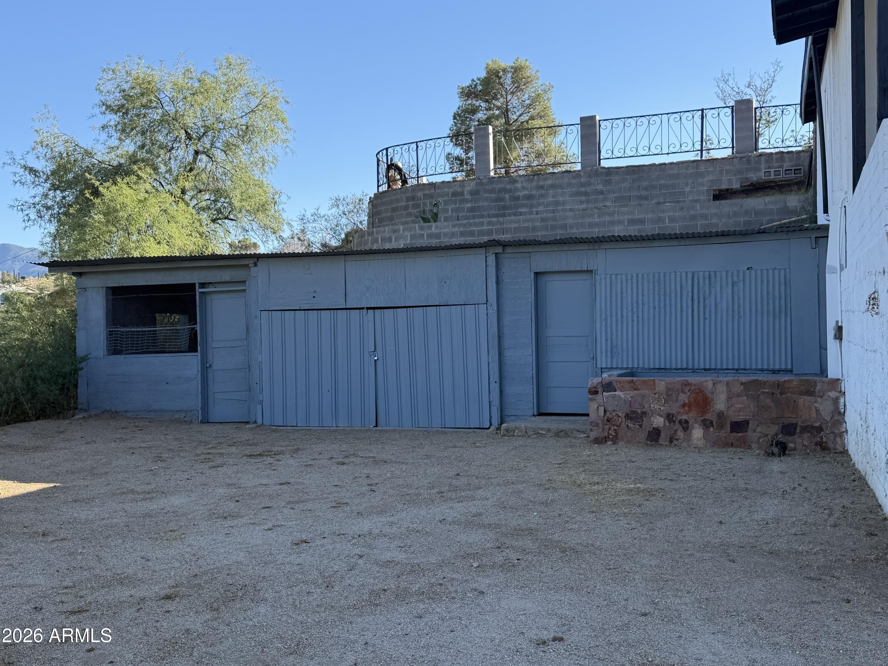 360 Pinal Street Globe, AZ 85501 - Photo 11 of 13 a view of backyard with wooden fence