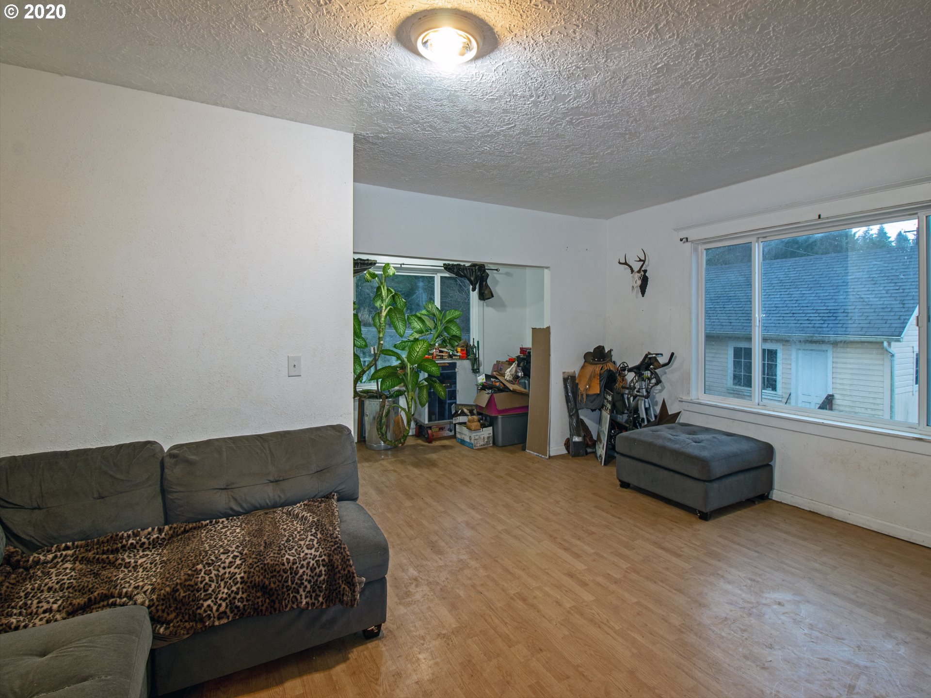18711 Beaver Falls Road Clatskanie, OR 97016 - Photo 4 of 14 a living room with furniture and a window