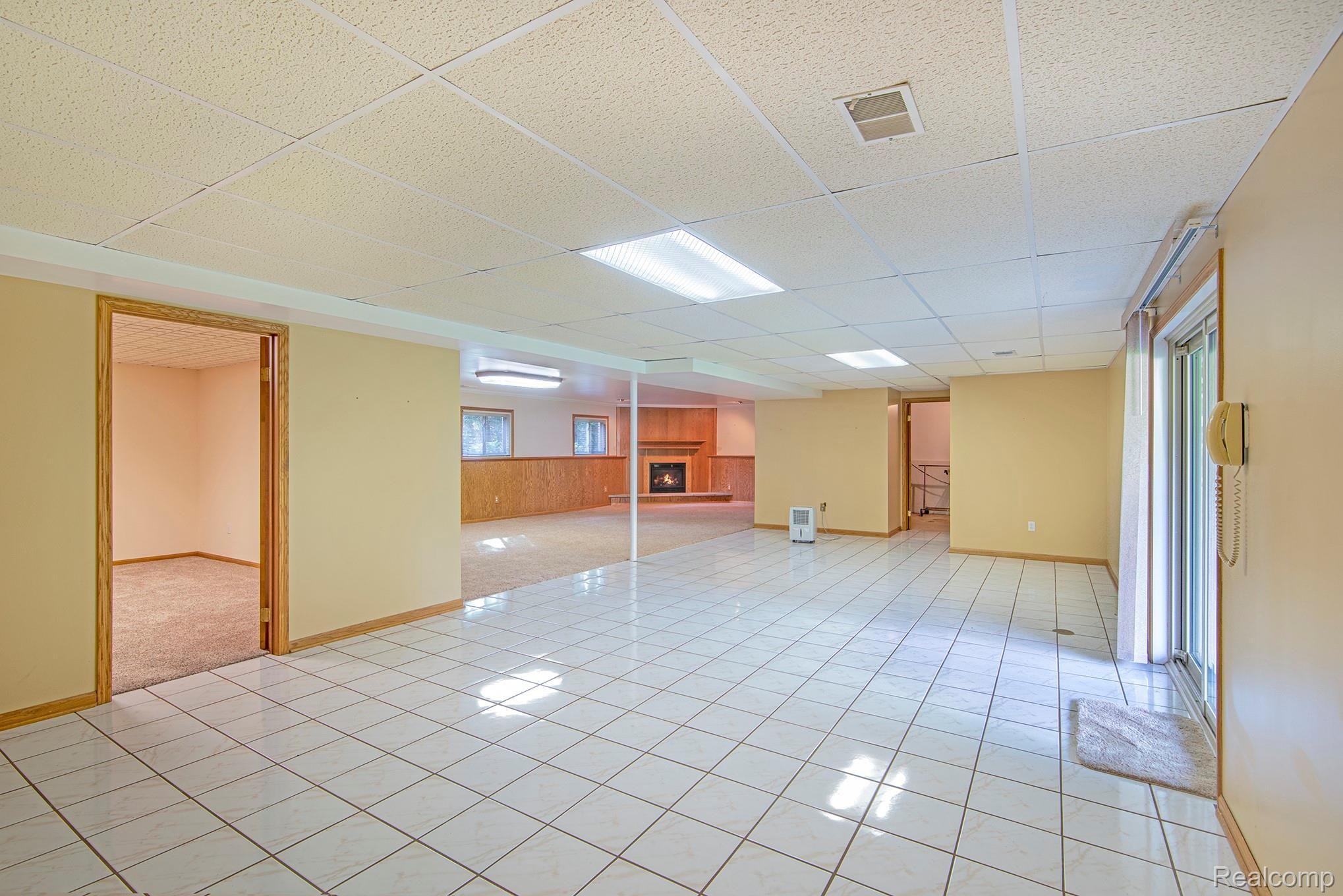 9510 Henderson Road Goodrich, MI 48438 - Photo 22 of 44 Finished Basement