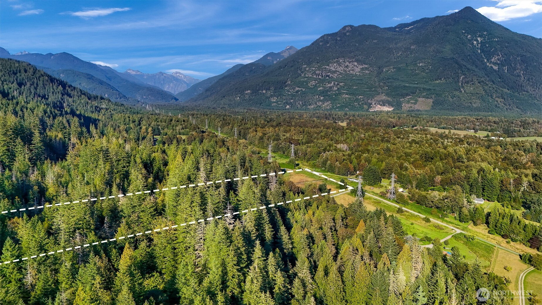 7530 Powerline Road Marblemount, WA 98267 - Photo 8 of 13 a view of a yard with a mountain