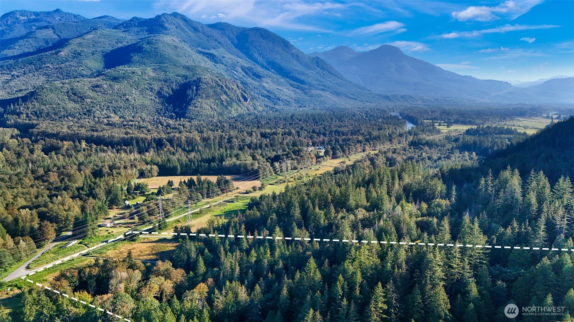 7530 Powerline Road Marblemount, WA 98267 - Photo 9 of 13 a view of a garden with a building in a yard