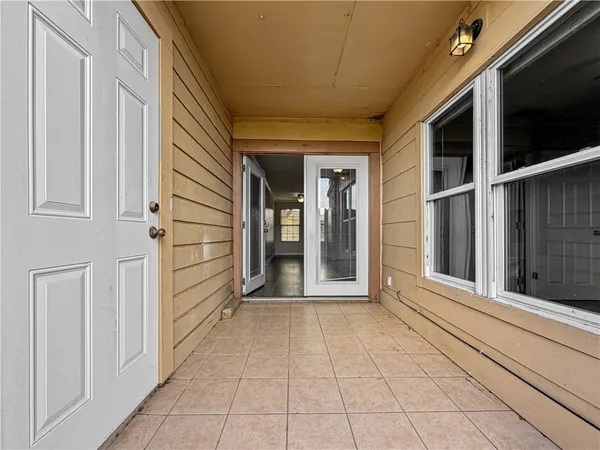 a view of a balcony with an outdoor space