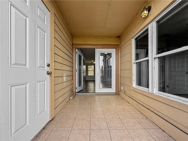 a view of a balcony with an outdoor space
