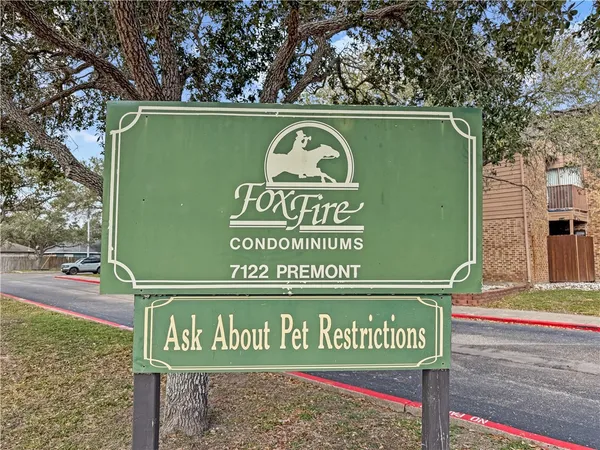 a sign that is on the side of a building