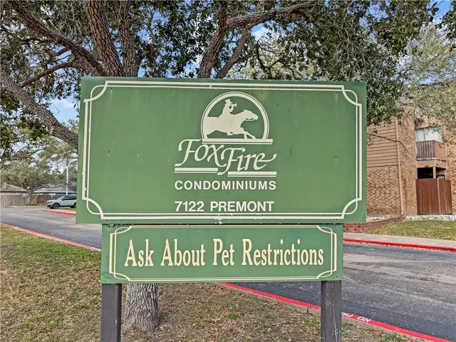 a sign that is on the side of a building