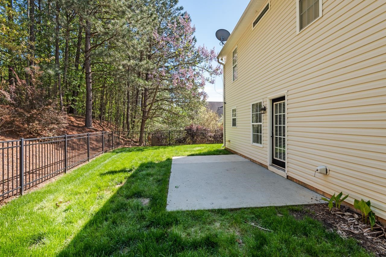 308 Saranac Ridge Drive Holly Springs, NC 27540 - Photo 36 of 41 a view of backyard with green space