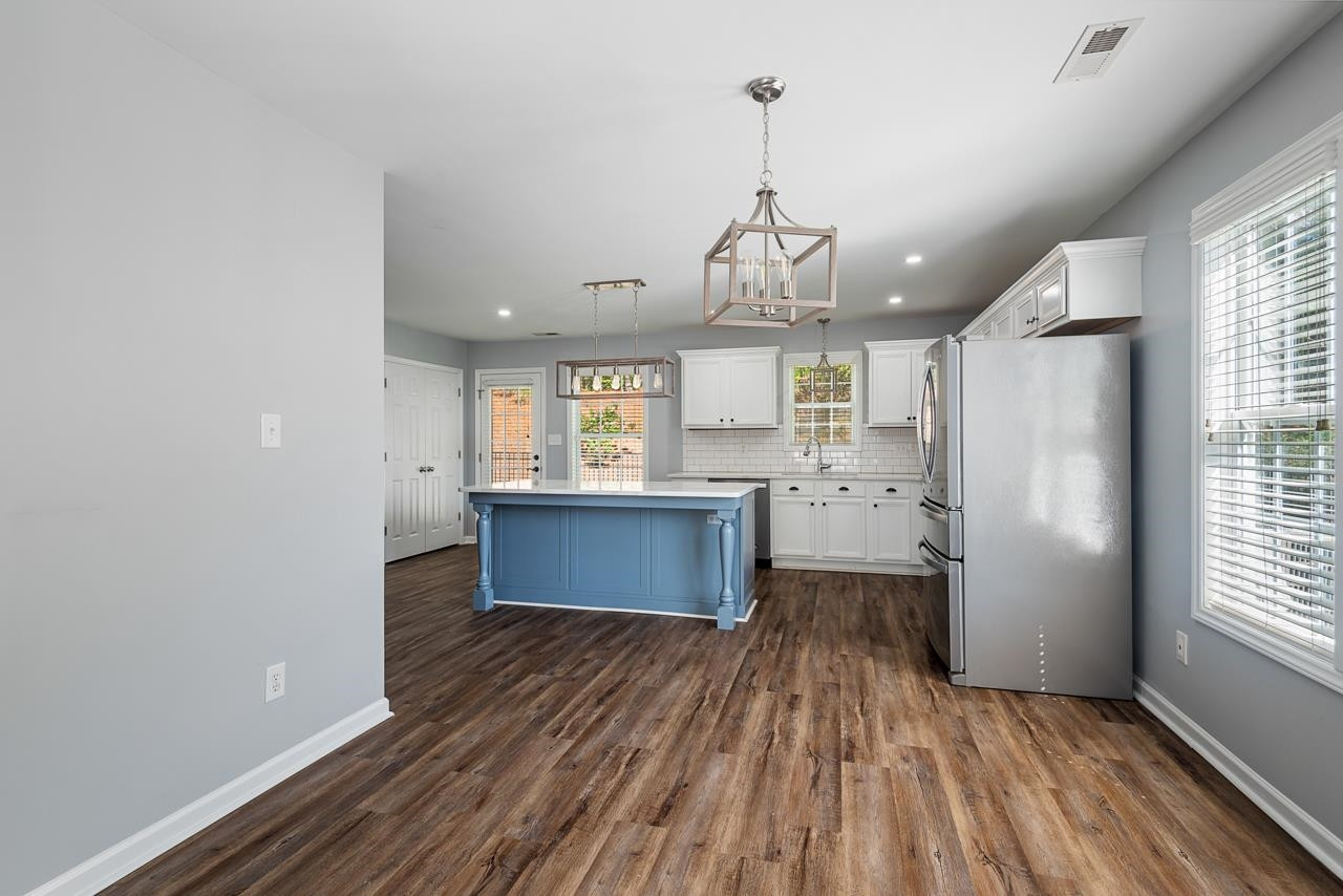 308 Saranac Ridge Drive Holly Springs, NC 27540 - Photo 9 of 41 a view of kitchen and windows