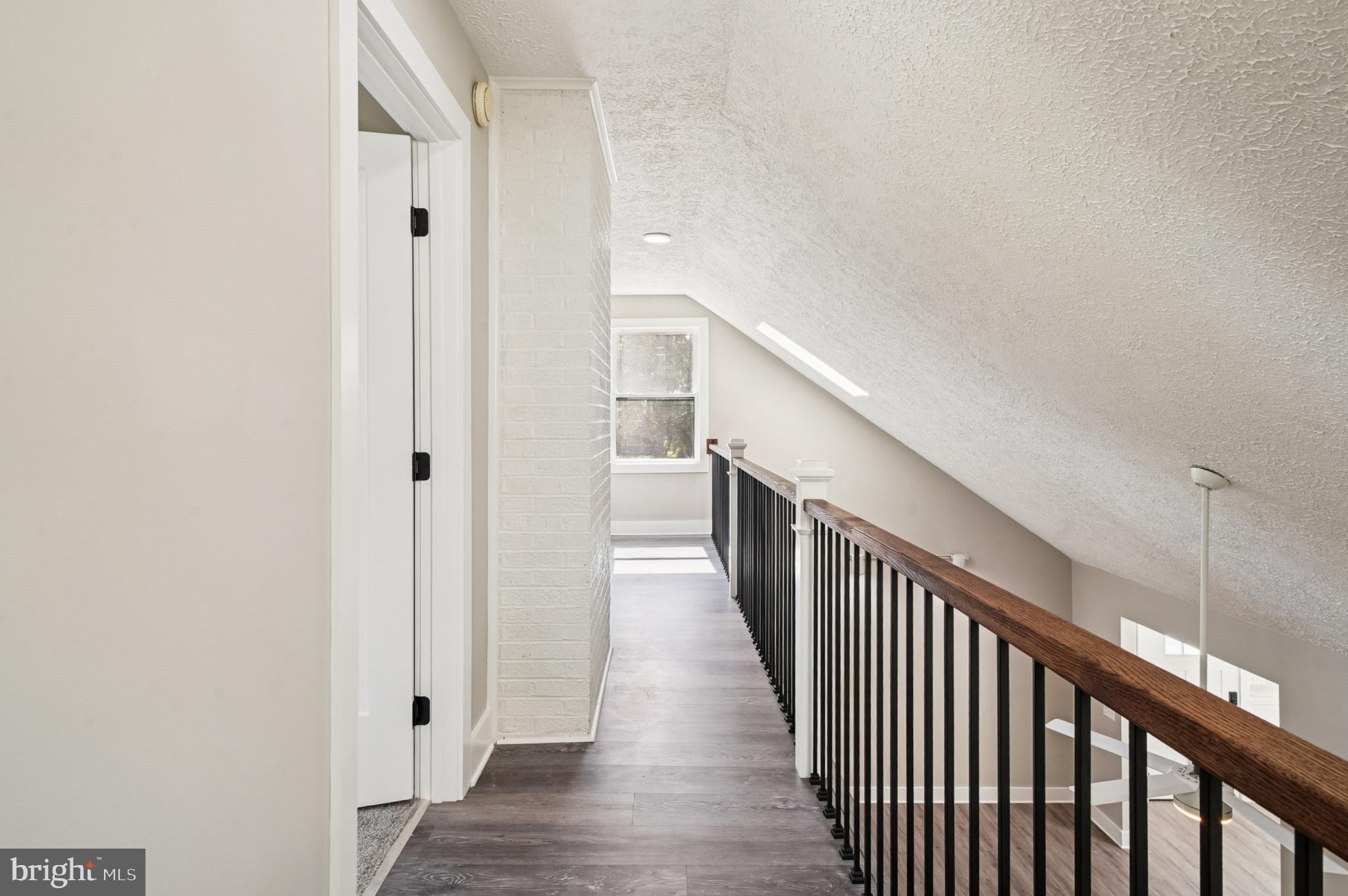 123 Long Point Road Stevensville, MD 21666 - Photo 20 of 47 Bright and airy upper-level hallway.