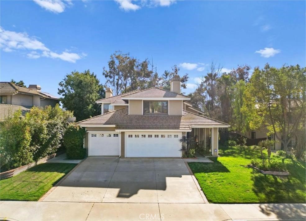 42050 Humber Drive Temecula, CA 92591 - Photo 2 of 31 a view of a house with garden