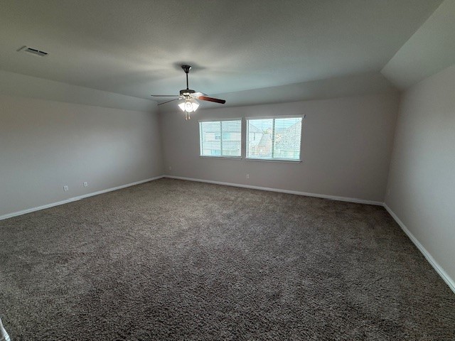 1109 Tabernash Leander, TX 78641 - Photo 13 of 23 en empty room with windows and chandelier fan