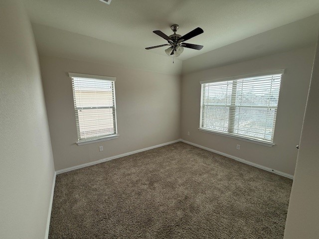 1109 Tabernash Leander, TX 78641 - Photo 19 of 23 an empty room with windows and fan
