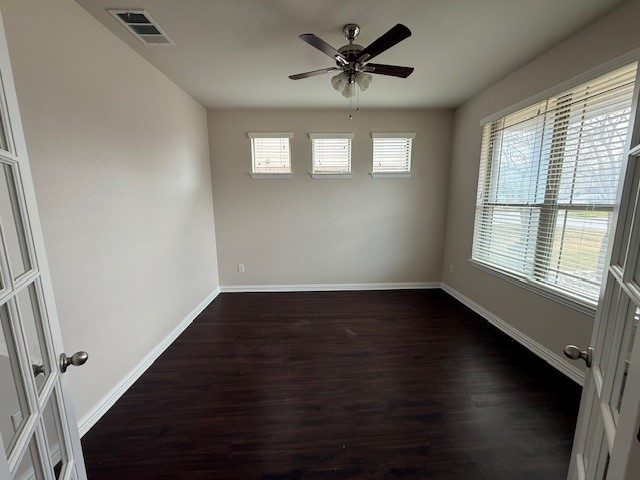 1109 Tabernash Leander, TX 78641 - Photo 3 of 23 a view of an empty room with wooden floor and a window