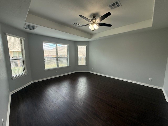 1109 Tabernash Leander, TX 78641 - Photo 9 of 23 a view of an empty room with wooden floor and a window