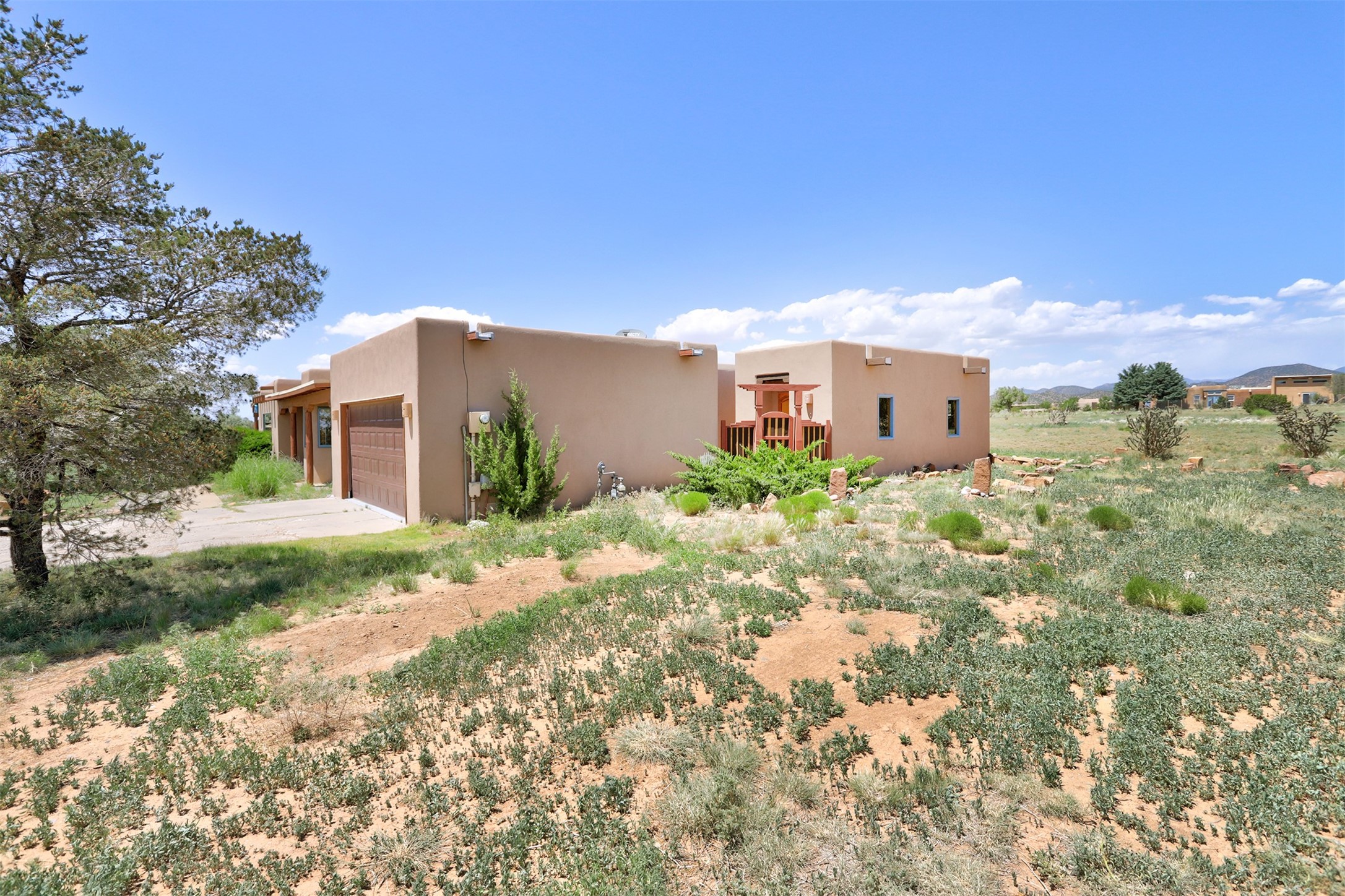 10 Carlito Road Santa Fe, NM 87508 - Photo 24 of 32 2 Car garage and on the right is the freestanding studio