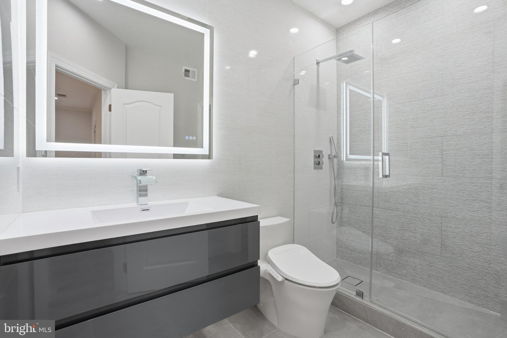 891 Chinquapin Road McLean, VA 22102 - Photo 41 of 78 Sleek modern bathroom with elegant finishes.