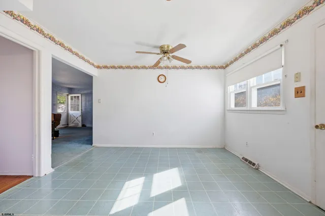 a view of a livingroom with a hallway