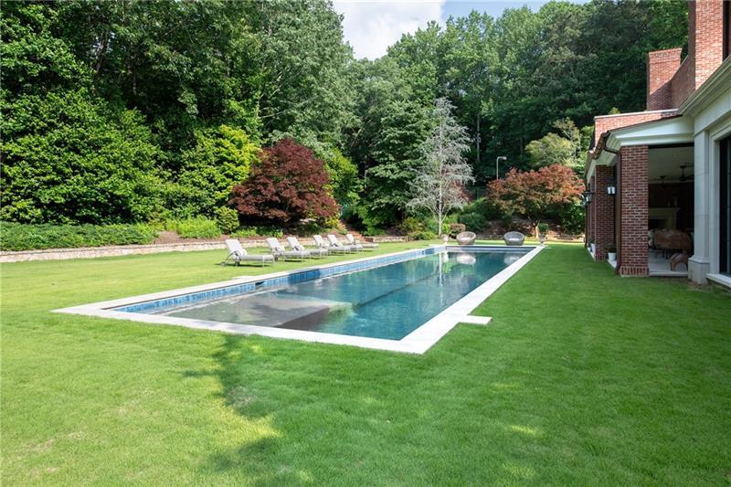 4615 Northside Drive Northwest Atlanta, GA 30327 - Photo 36 of 69 a view of a backyard with swimming pool
